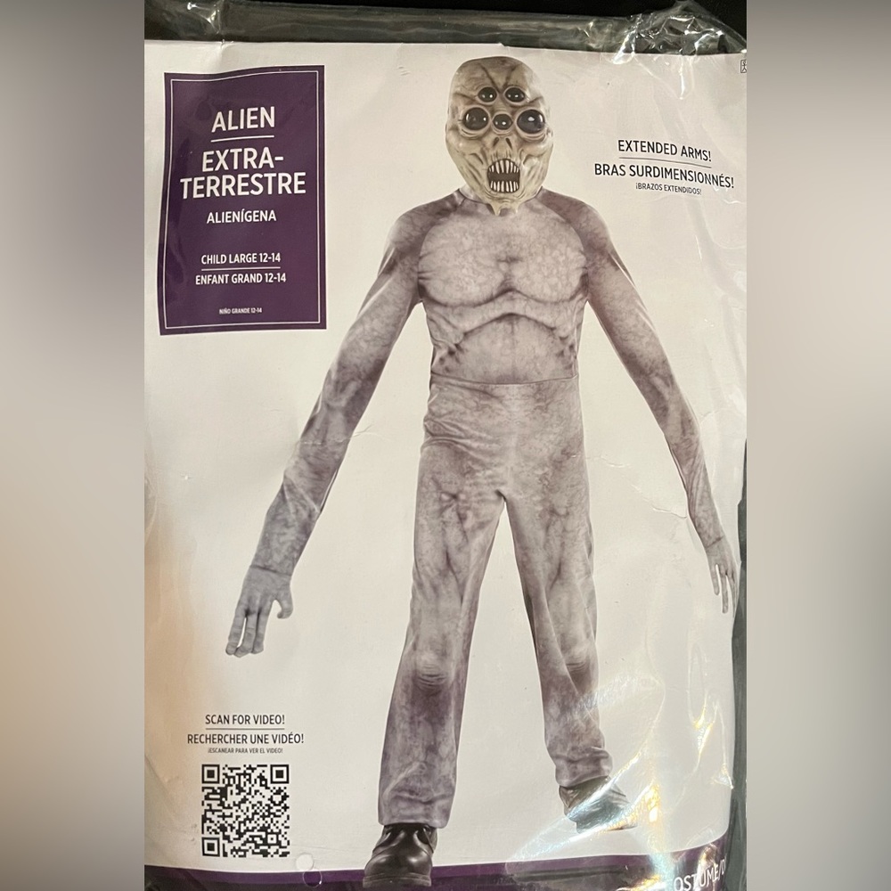 Long Arm Alien Costume Child Large (12-14). 
New in package